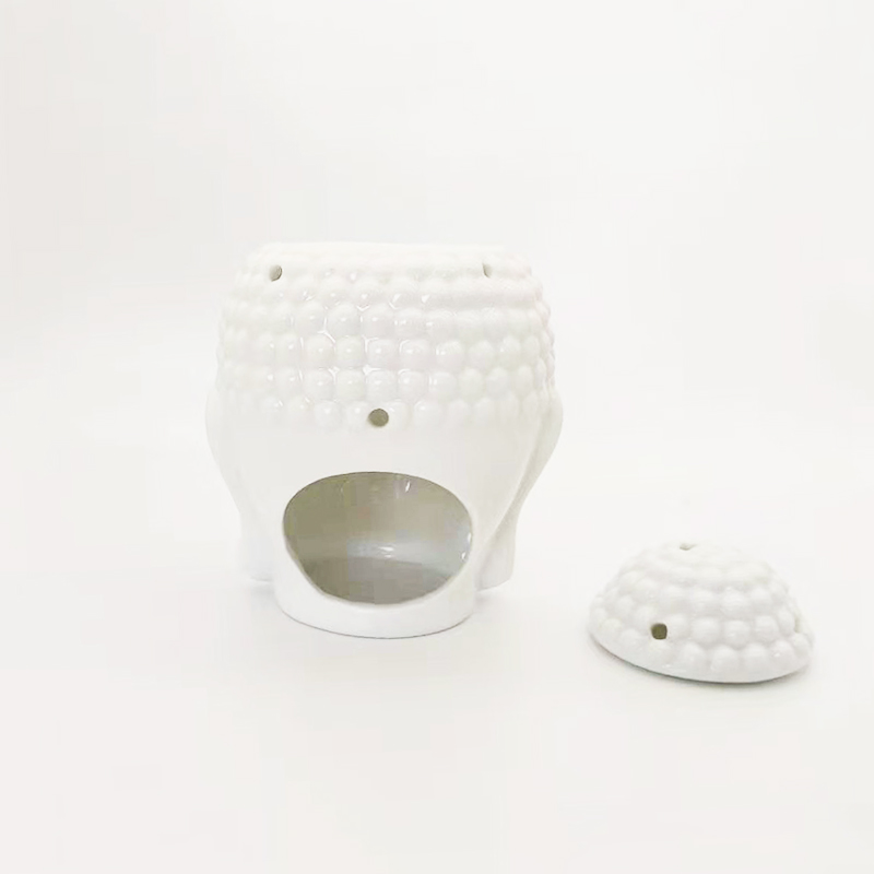 Wholesale white Buddha head ceramic oil burner Australia with customized packaging